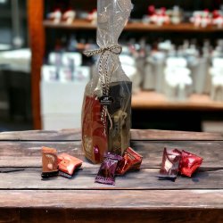 Marcipanblomster, vingummi og bolsjer i gavepose