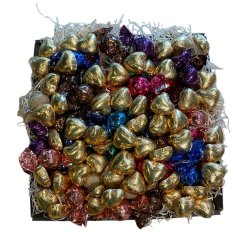 Julegavekurv med guldhjerter og chokoladetwisters