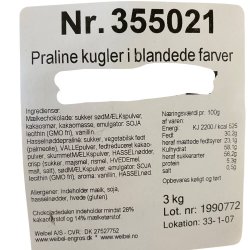 Varedeklaration og ingrediensliste til Weibel chokolade: Overskueligt billede af indholdsfortegnelsen p� papir med varenummer 355021, stillet op mod et lyst tr�underlag